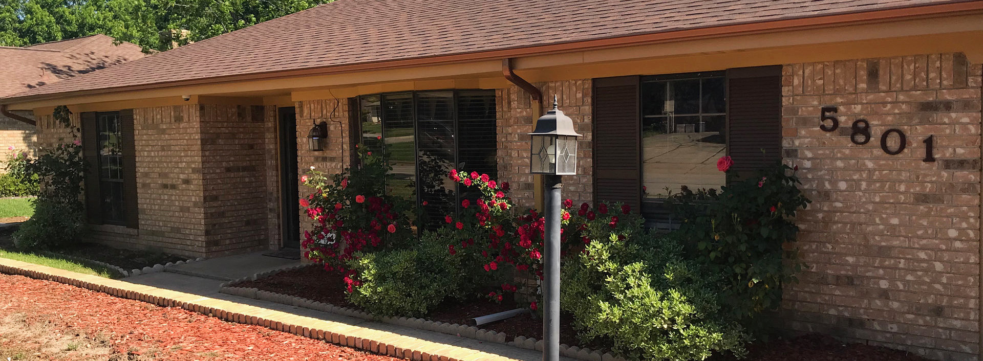 a picture of a house's front yard